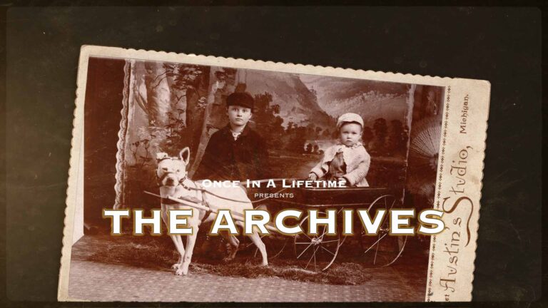 A white pit bull dog with children on a cabinet card photograph from 1893